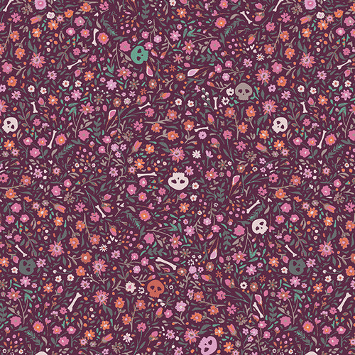 Dark floral fabric with hidden skulls, bones, and vines on a plum background.
