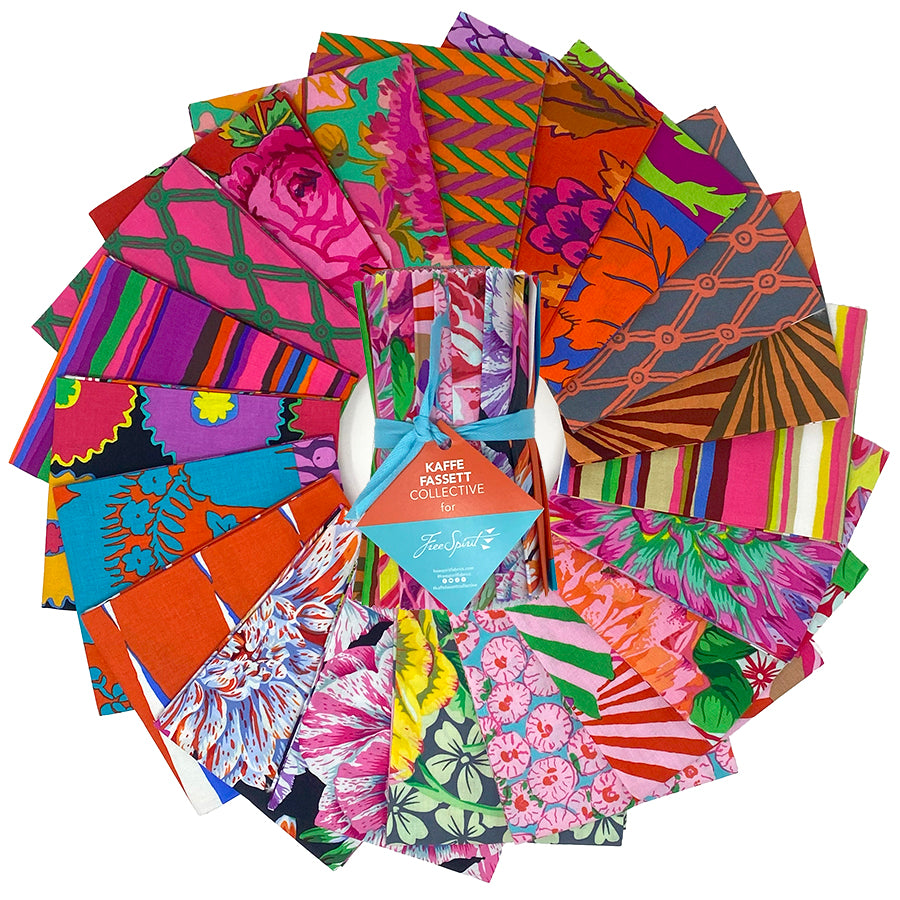 Kaffe Fassett Collective February 2026 Warm design roll with 20 precut 6 inch quilting fabric strips in red orange and pink tones